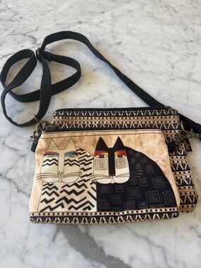 Laurel Burch crossbody canvas double zip bags.